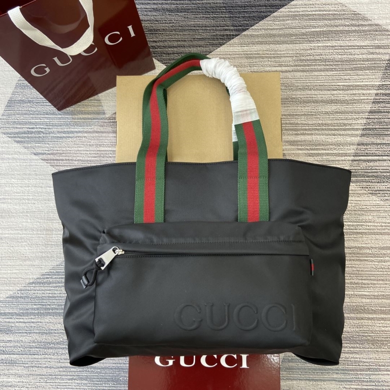 G*u*i shopping bags